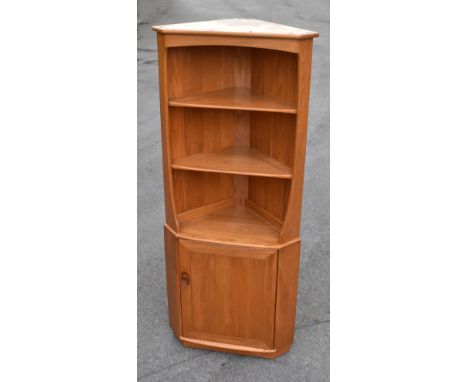 ERCOL; a light elm freestanding corner cupboard, with cupboard door, height 180cm.