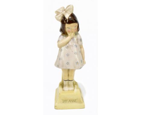 L. PERUGINI FOR ROYAL DOULTON; a rare figure, HN60 'Shy Anne', introduced 1916, withdrawn by 1938, unusually decorated with b