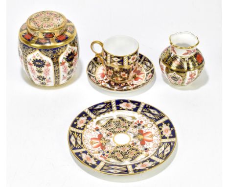 ROYAL CROWN DERBY; a ginger jar and cover decorated in Imari pattern 1128, height 11cm, together with a similar vase, height 