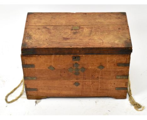 A late 19th century small camphor wood trunk, with later handle, height 38cm, width57cm, depth 33cm.&nbsp;