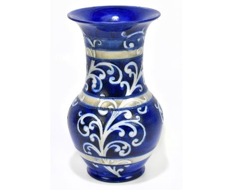 WILLIAM MOORCROFT; a baluster vase with flared rim decorated in the 'Honesty' pattern, on a salt glazed ground, blue signatur