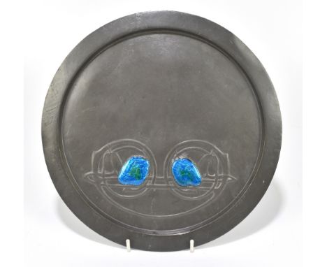 ARCHIBALD KNOX FOR LIBERTY & CO; a Tudric pewter and enamelled circular plate, no.0163, diameter 25.5cm.Provenance: private c