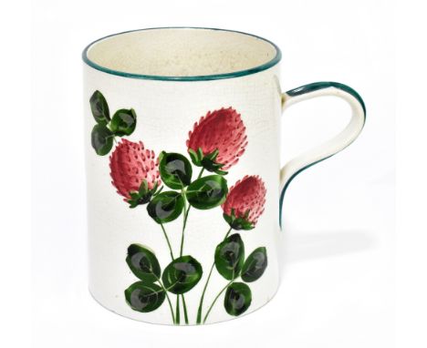 WEMYSS WARE; an hand painted oversized mug decorated with a flowering pink clover beneath a green rim, impressed marks and re