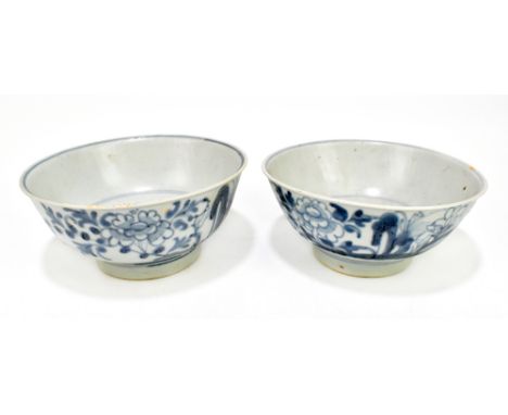 TEK SING CARGO; Two Chinese bowls painted with floral sprays in blue and white, diameter 17.25cm and 16.75cm.Provenance: priv