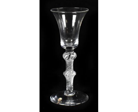 A 19th century wine glass, with bell shaped bowl and twin knopped stem with air twist detailing, height 17cm.Additional Infor