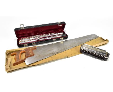 GRASSI, a Professional 2000 flute in fitted case, with a Hohner harmonica and a musical saw, (3).