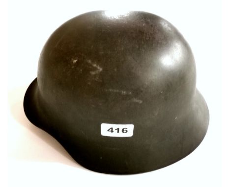 A steel Military helmet.