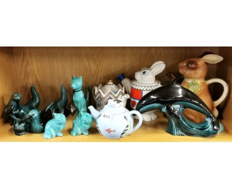 A quantity of Poole and other pottery items.