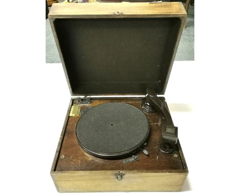 A vintage HMV portable record player, size 38 x 33 x 18cm. Condition : Not w/o.