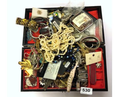 A large box of costume jewellery.