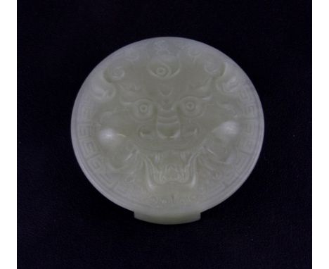 A Chinese carved nephrite jade belt buckle, Dia. 5.7cm.