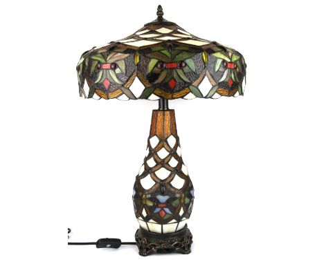 A superb Tiffany style table lamp with illuminated body, H. 58cm.