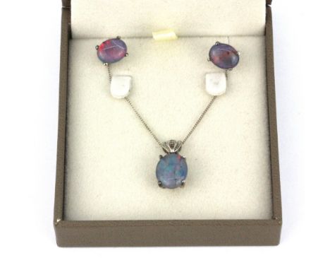 A 925 silver pendant and chain and matching pair of stud earrings set with opal triplets.