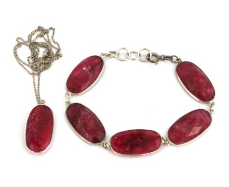 A 925 silver bracelet and matching pendant and chain set with faceted cut ruby.