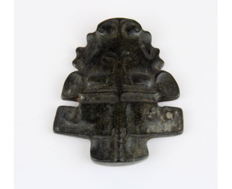 An unusual Japanese dark green jade / hardstone bull's head netsuke, H. 7cm.