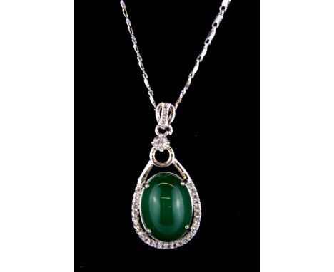 A Chinese green jade and 18ct white gold plated pendant on an 18ct white gold plated chain.