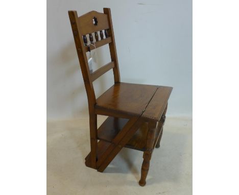 An Arts and Crafts metamorphic chair/ladder, on turned supports 