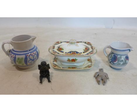 2 hand-painted English studio pottery jugs H: 14cm and 10cm with a 1940's lidded tureen and plate, a bronze seated cherub 7 x
