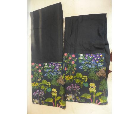 A pair of lined curtains in black cotton and floral fabric designed by Josef Frank and made by specialist curtain-maker Pat G