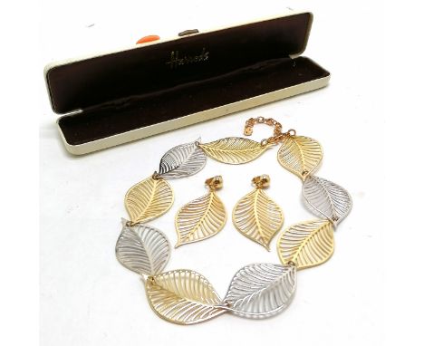 Christian Dior gold &amp; silver tone leaf design necklace (52cm) + earrings in a Harrods box 