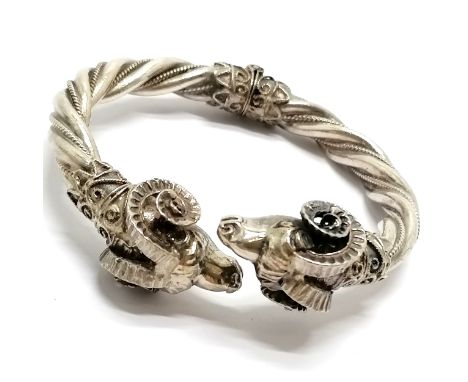 Silver sprung bangle with double rams head detail - 7cm &amp; 43g total weight 