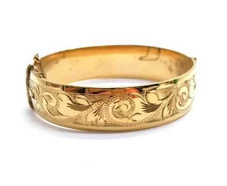 9ct gold metal core bangle with engraved detail to front - 6cm across &amp; 42g total weight ~ in virtually unused condition 