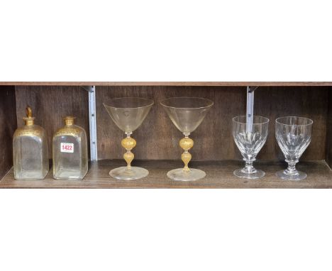 A pair of early 20th century Venetian style gilt and clear glass goblets, attributed to James Powell &amp; Sons, Whitefriars,