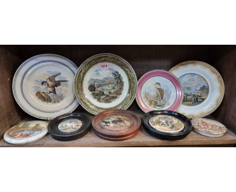 A group of Prattware plates and pot lids. (9) 