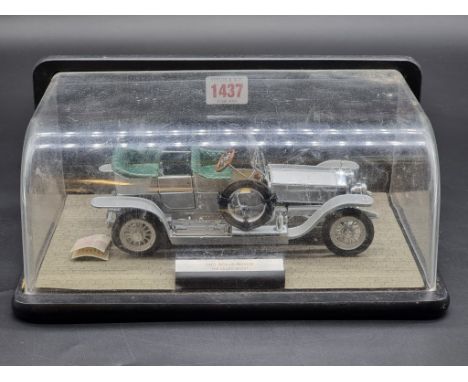 A Franklin Mint 1907 Rolls-Royce Silver Ghost, (s.d.), cased, the whole 28cm wide.