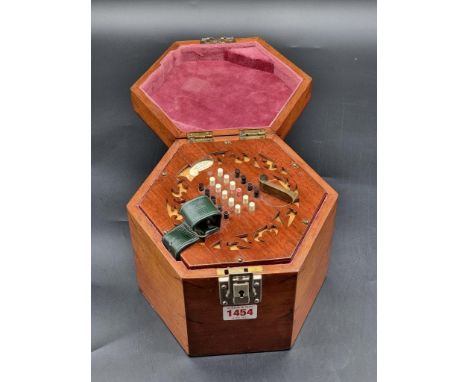 A vintage mahogany concertina, labelled 'Rock Chidley, Manufacturer,...London', boxed.