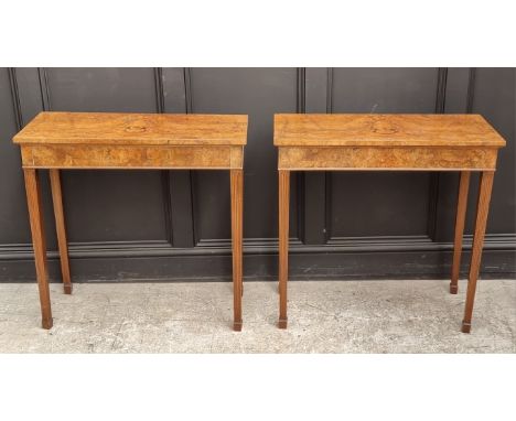 A pair of figured walnut console tables, 84cm wide.