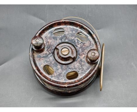 Angling: an ELO Bakelite fishing reel, 11.5cm diameter.