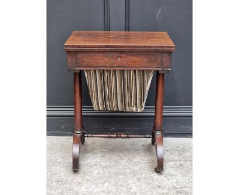 A Victorian rosewood work table, with fold-over card table surface, 53.5cm wide.