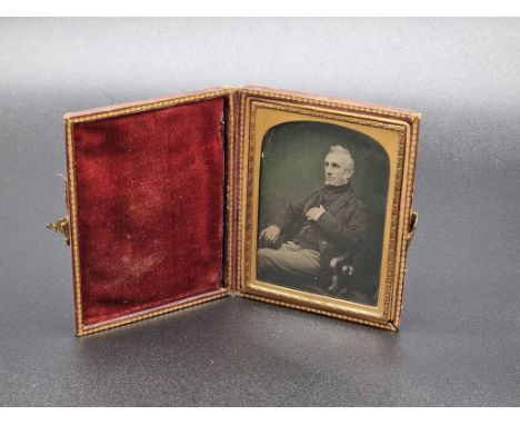 Photography: a 19th century ambrotype, 10 x 7cm, in leather case.