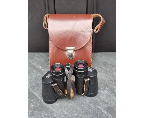 A pair of Carl Zeiss 'Jenoptem' 8x30W binoculars, cased.