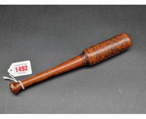 Angling: a 19th century fruitwood priest, 25cm long.
