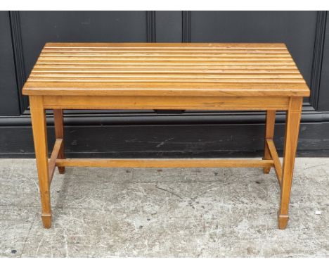 An Edwardian walnut and inlaid luggage stand, 80cm wide.