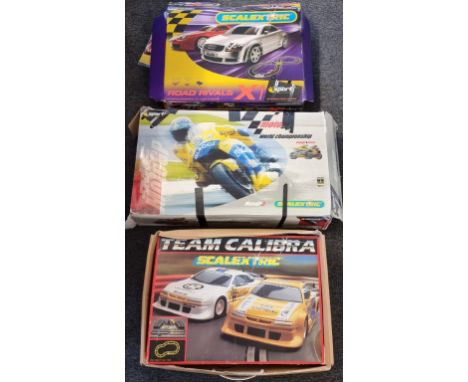 Scalextric: three sets, comprising 'Road Rivals X1'; 'Team Calibra'; and 'MotoGP 2'.