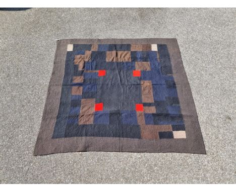 A patchwork quilt, possibly American, 215 x 202cm.