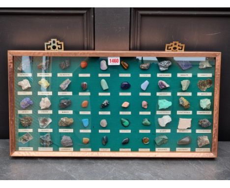 Natural History: a copper framed display of fifty rock and mineral specimens, 29 x 57cm.
