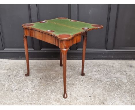 An 18th century walnut and crossbanded double gateleg card table, with counter wells and outset corners, 77cm wide.