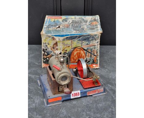 A Wilesco D6 stationary steam engine, boxed; together with a vintage West German clockwork automaton monkey musician, 23cm hi