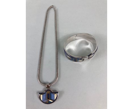 Designer Jewellery by Michaela Frey ,Vienna, abstract design half Luna pendant on a 925 marked snake chain and a Bangle with 
