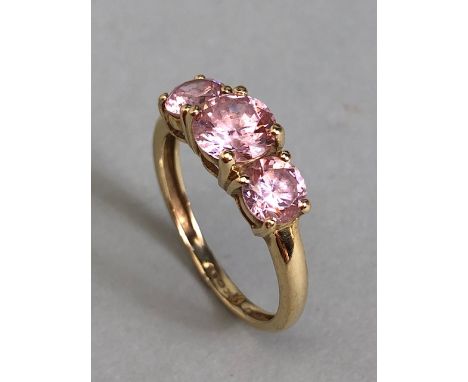 14ct Gold ring three stone pink gemstones size 'M'