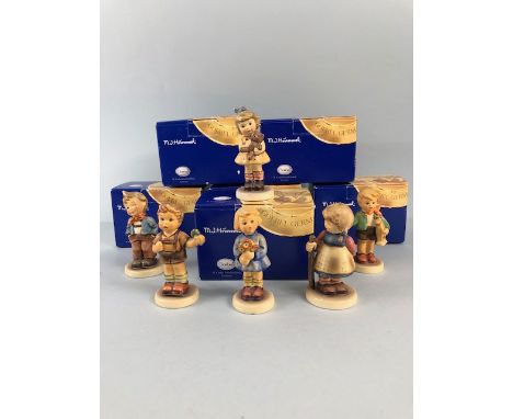 Hummel collectors figures by Goebel Germany to include, 822 Girl with Nose Gay, 029 Pixie, 1991 A four leaf clover, 189 Scamp