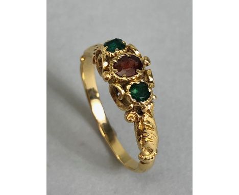 Antique unmarked gold ring of Victorian style design set with gemstones  mounted in scroll work gold size approx 'K' & 2.3g