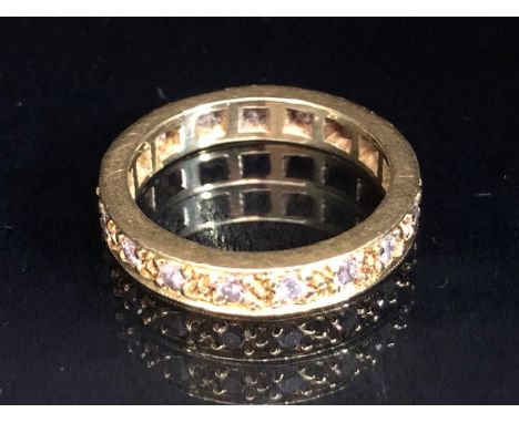 Diamond set yellow metal full eternity ring (18) set with diamonds, in a classical design approximately 3.93g size J1/2