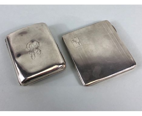 English hallmarked silver, Two cigarette cases, one plain with engraved initials, A.F,  the other with engine tuned design an