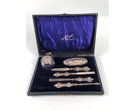 Hallmarked silver mounted and boxed manicure set hallmarked for Birmingham by maker G & C Ltd 