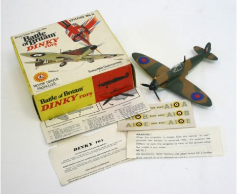  Dinky Toys 719 Spitfire Aeroplane Mark II From The Film “Battle Of Britain” camouflaged body RAF Roundals, motor driven prop